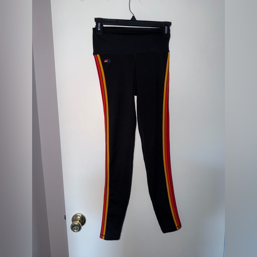Aviator Nation Black Leggings with Red and Yellow Side Stripes
